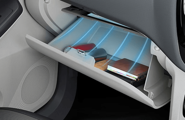 Tata Tiago EV innovative cooled glove compartment with AC ventilation system for keeping beverages, medicines, snacks and personal items fresh during long electric vehicle journeys in Indian climate conditions