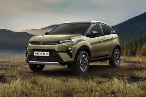 Front left side view of a green Tata Nexon SUV