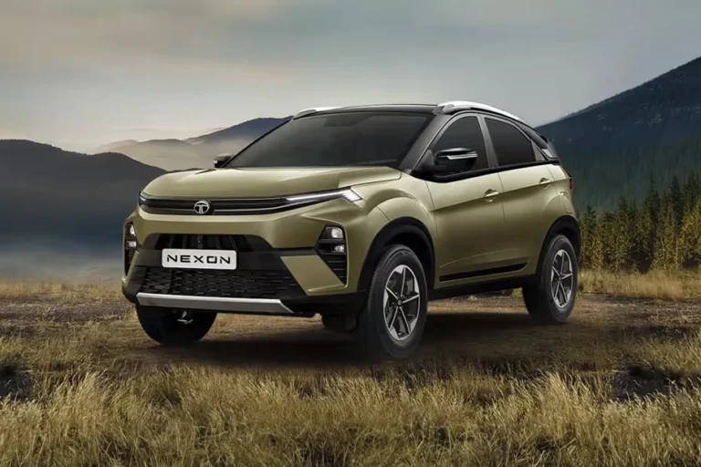 Front left side view of a green Tata Nexon SUV